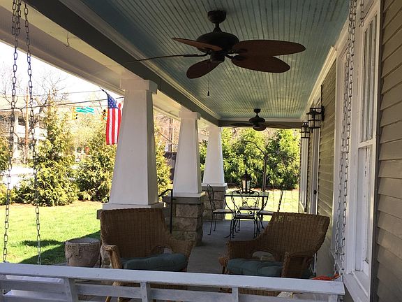 Covered front porch with swing