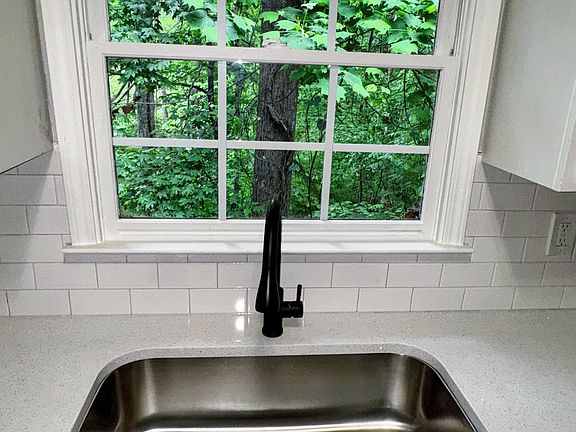 Quartz counter and Stainless sink and New faucet
