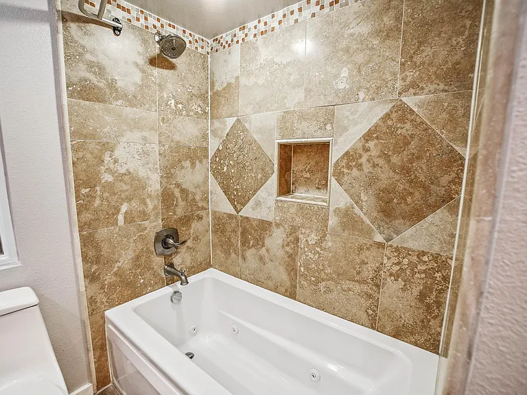 Jacuzzi tub / shower combo.