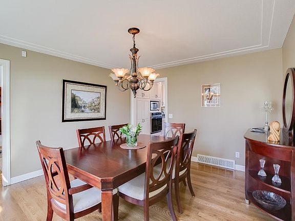 Natural Sophistication!  Balance of beauty and comfort! Sit back & enjoy TV viewing while looking over the deck!(Large TV alcove & storage for electronics)