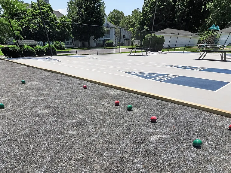 Enjoy leisure time at Vista Point Apartments with our vibrant outdoor space featuring a well-maintained bocce ball court. Perfect for friendly competition and relaxation, this community amenity enhances your lifestyle. Join us today!