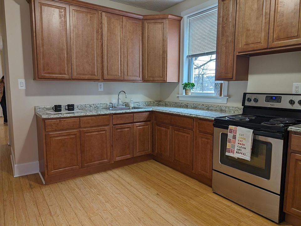 Lots and lots of cabinets in this LARGE eat in Kitchen!