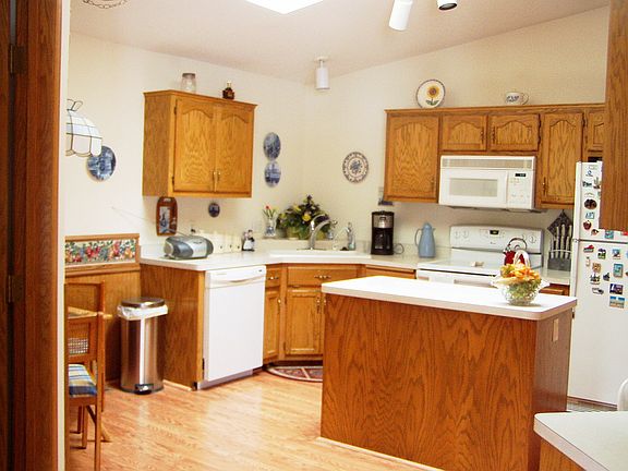 Large kitchen with eat in, center island and lots of cabinet