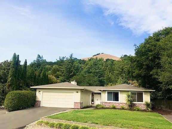 street view showing 3 driveways