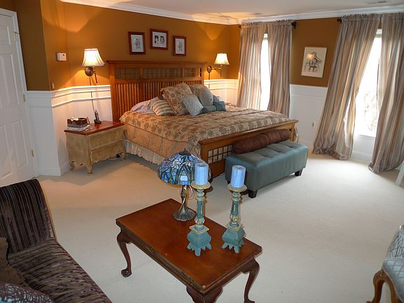 Master bedroom with dressing room, sitting room and private master bath