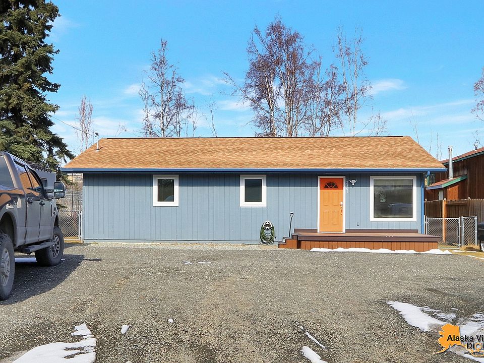 Front View with Large Driveway.