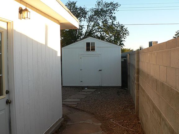 Large storage shed in backyard