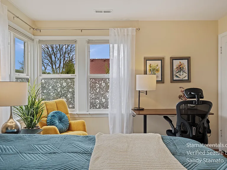 Corner windows fill the Broadview Bedroom with natural light, blue skies, and exceptional privacy.