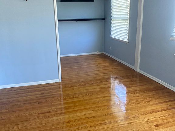 This is the open dining area. Note all the wonderful natural lighting coming into the rooms. And of course the hardwood flooring.