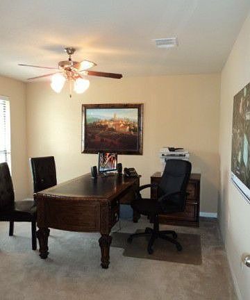 Home office/bedroom. Photo of model of same floorplan