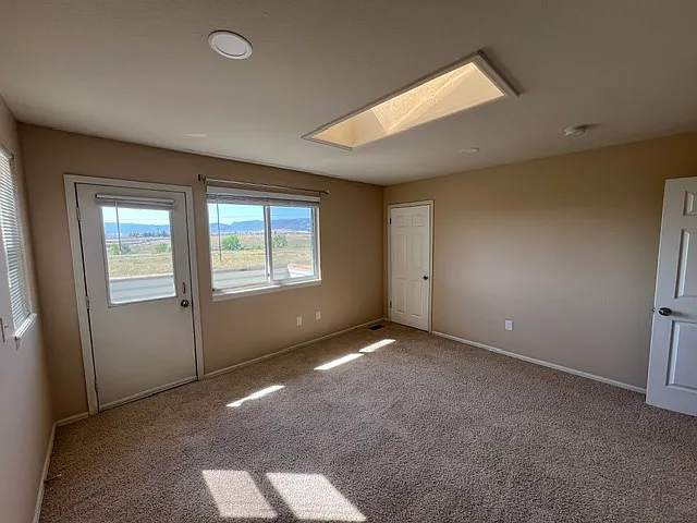PRIMARY BEDROOM.
