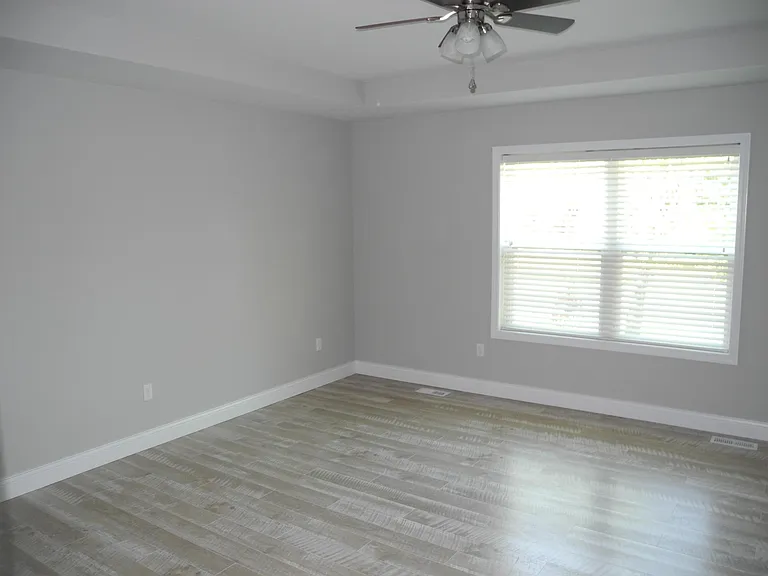 Master bedroom easily accommodates a King bed