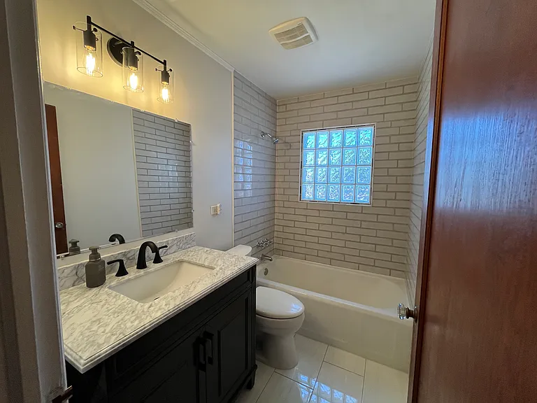 4745 N Raleigh St — Photo 8