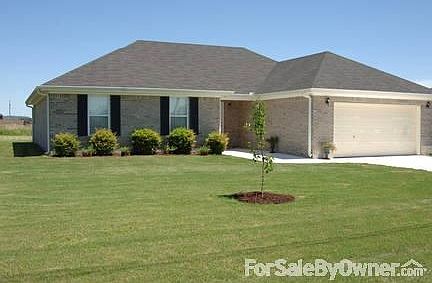 Front view : Front of house from street. Beautifully landscaped yard!