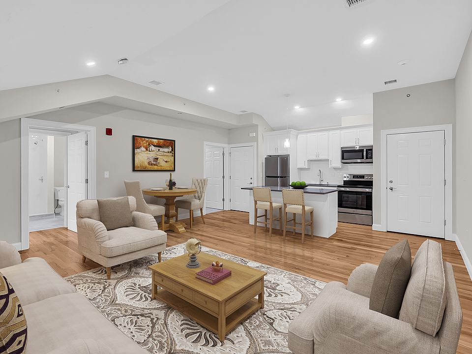 Virtually staged 17' x 14' living and dining area.