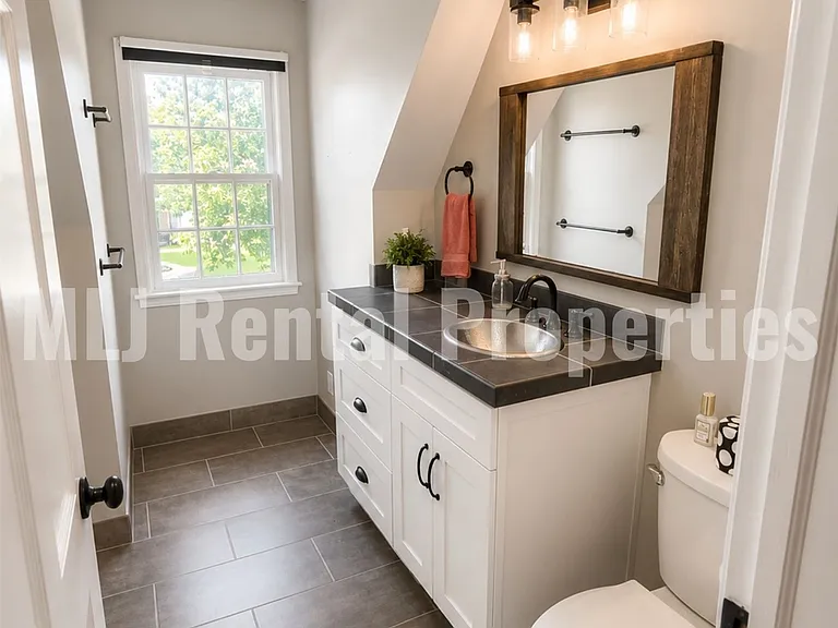 5881 S Irvington Ave — Photo 46