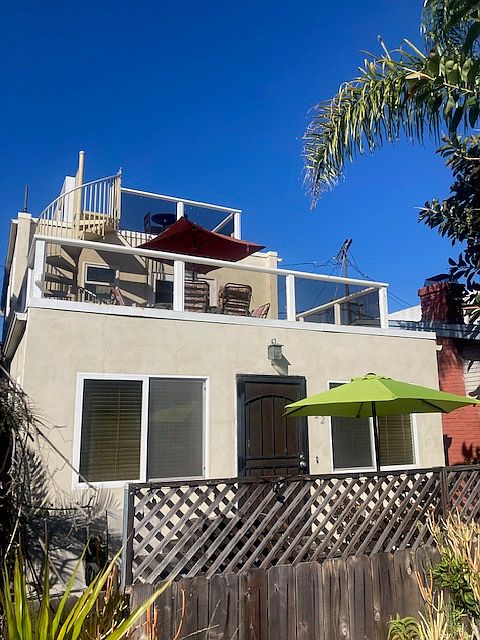 Exterior showing patio and two decks