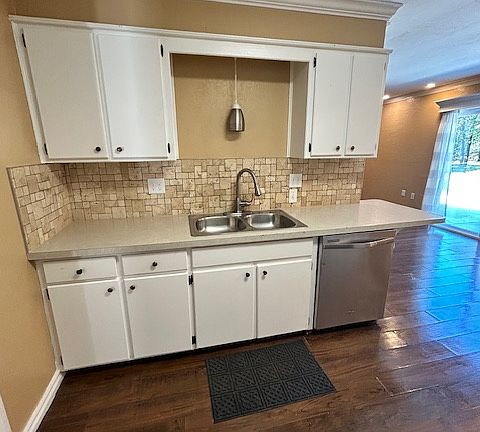 Open kitchen, stainless steel appliances