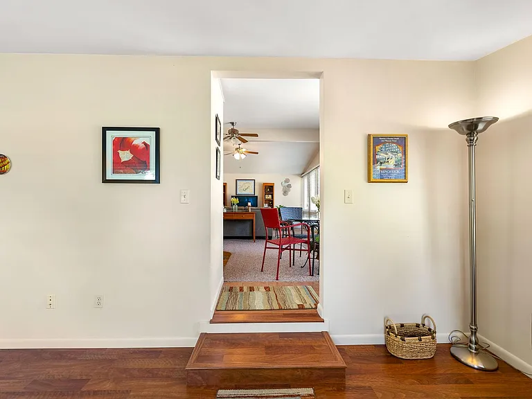 View from Sunroom into main OPEN kitchen, dining and living area.