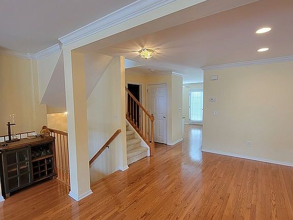 Stairs to foyer and 2nd flr