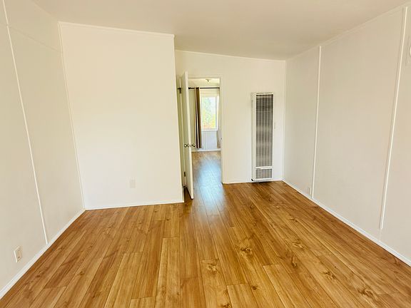 Entrance view of living room lots of natural light