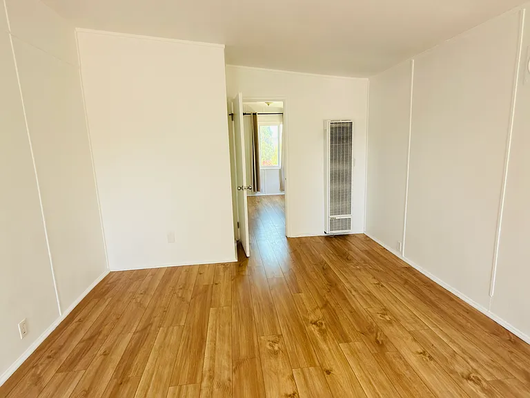 Entrance view of living room lots of natural light