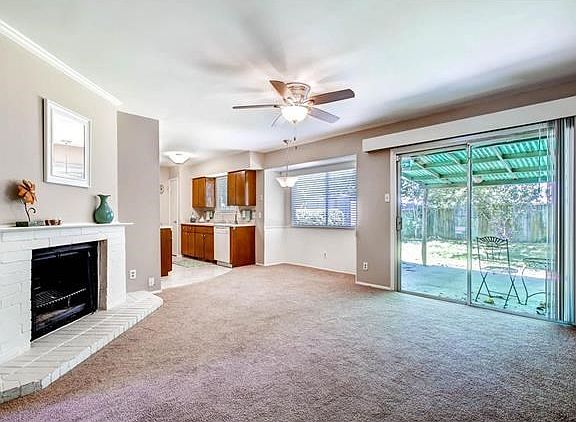 The family room is open to dining and kitchen.