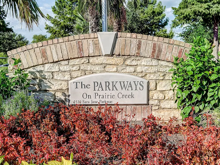 Parkways on Prairie Creek is surrounded by lush landscaping