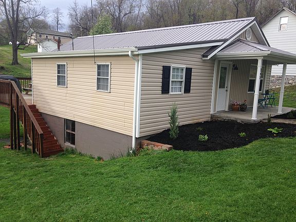Front / side w/ new roof & gutter
