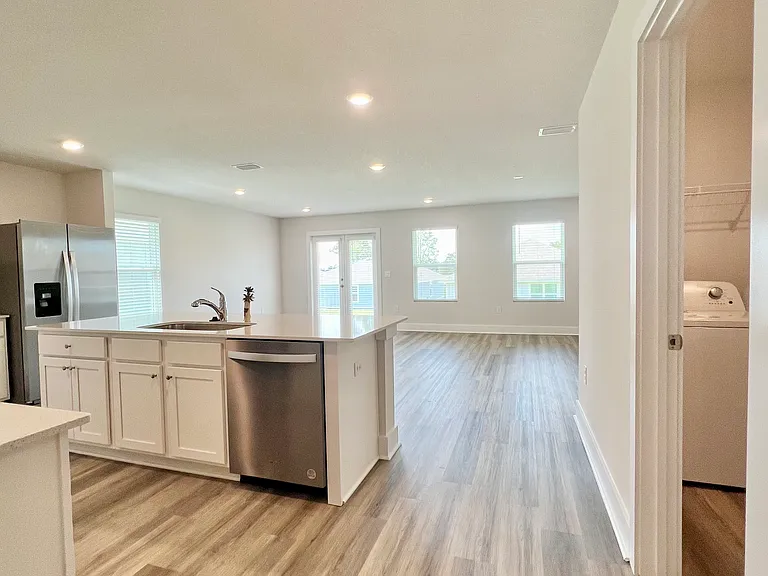 Hallway to main living/kitchen area