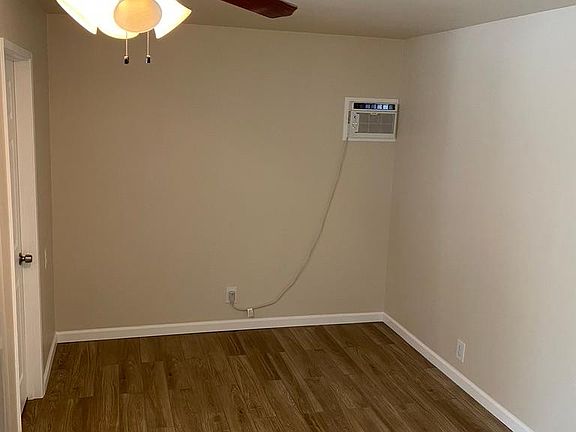 living room and new ac unit (w/ remote)