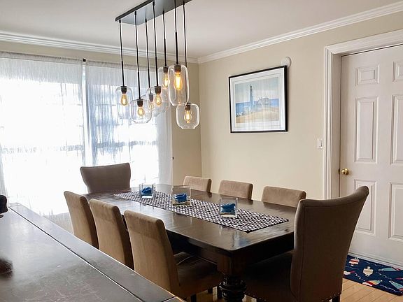 Large dining table is great to host large groups with an extra leaf to seat 10