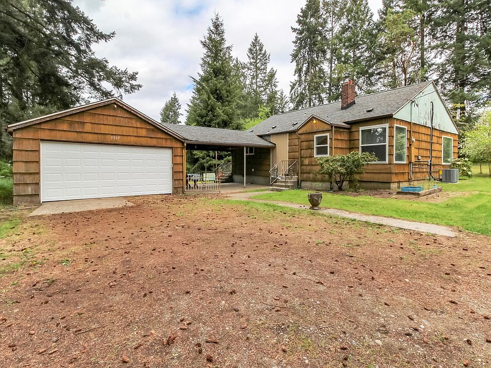 One story home with detached 2 car garage. Covered patio.