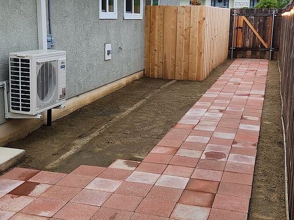 Paver walkway and sideyard.