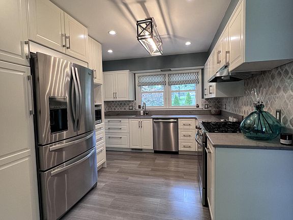 5th image of 11418 E River Dr