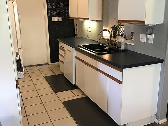 Kitchen w/ chalkboard wall
