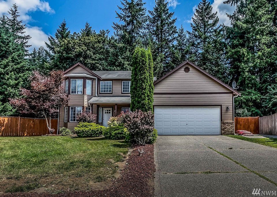 Almost a half acre lot with a wooded backdrop 