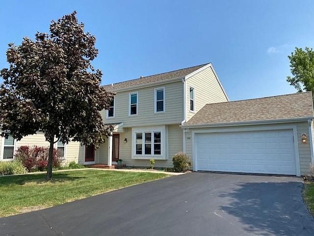 Private Front Entrance with 2 Car Attached Garage