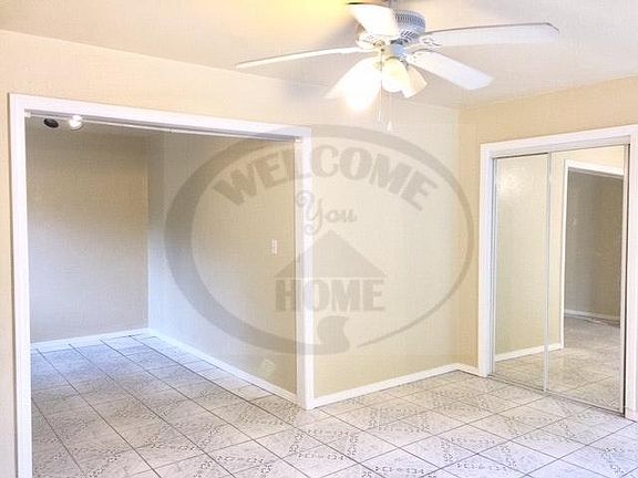 Living area and entrance to bedroom