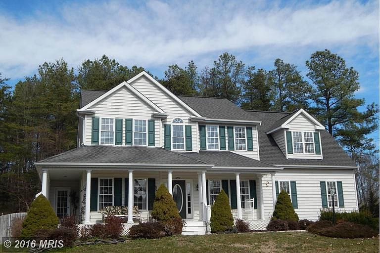 1.07 acres - Stunning Home  w/Wraparound Porch