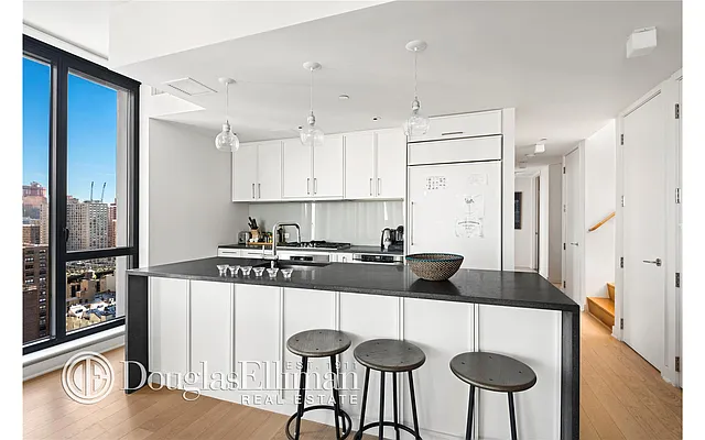 Rented by Douglas Elliman | media 50