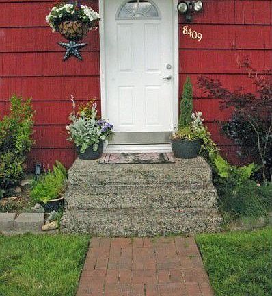 Walk up the quaint brick path to the brand new front door!
