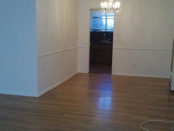 view of dining room and kitchen from front door