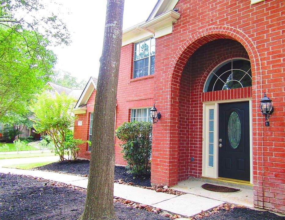 Beautiful red brick home with lots of curb appeal.