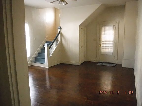 Front door viewed from across the living room.