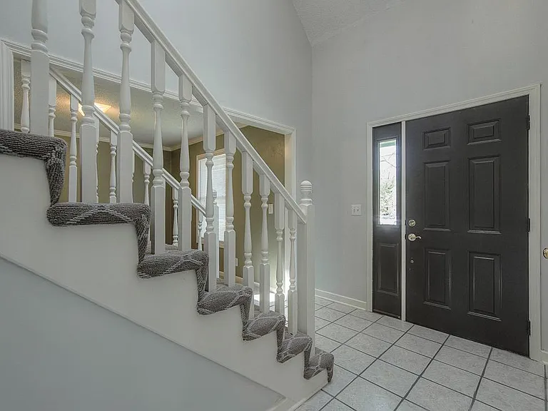 This lovely 2 story home has main floor living (and a bonus media room downstairs) with bedrooms and laundry upstairs.