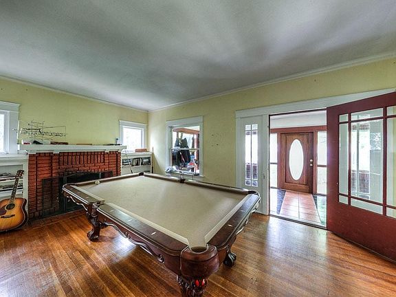 Den - Please note the pool table is no longer in the house.
