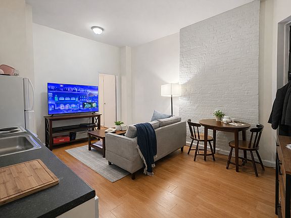 3rd image of 254 E 3rd St APT 14