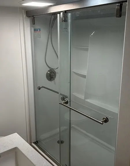Bathroom Shower with frameless shower doors installed