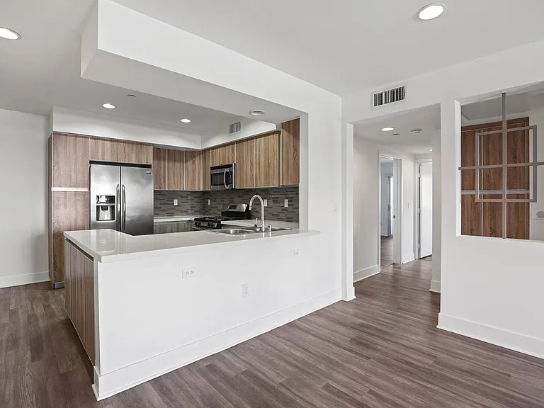 Kitchen with Countertop Bar and Dining Area